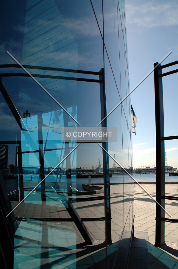 The podium's angular glass casing