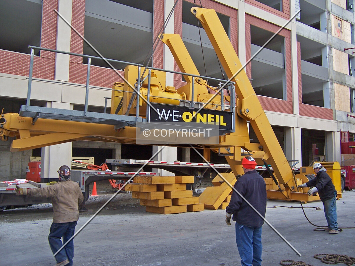 Disassembling the tower crane along Benson Street