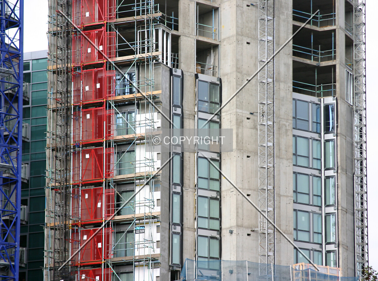 View north showing façade installation