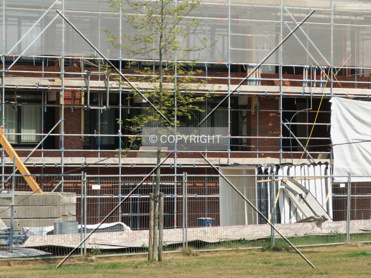 Façade reconstruction at the base