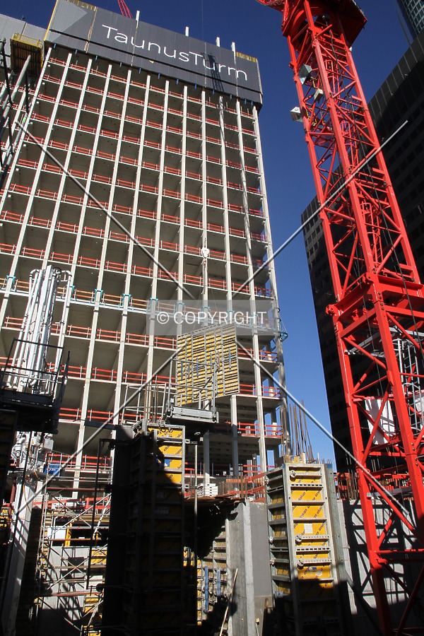 A formwork element is lifted using a construction crane