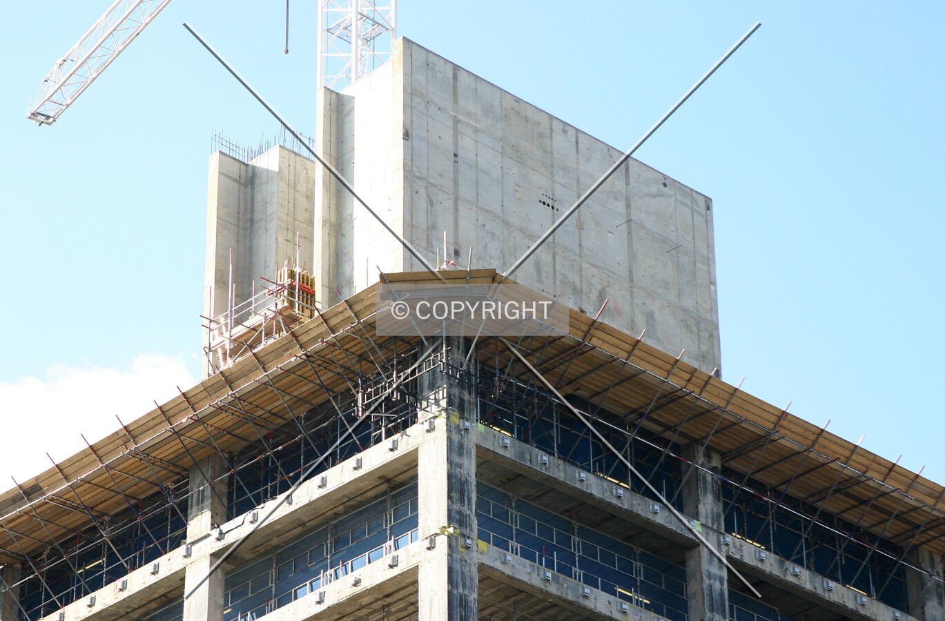 The top showing the extended core and removal of the pre-existing curtain wall