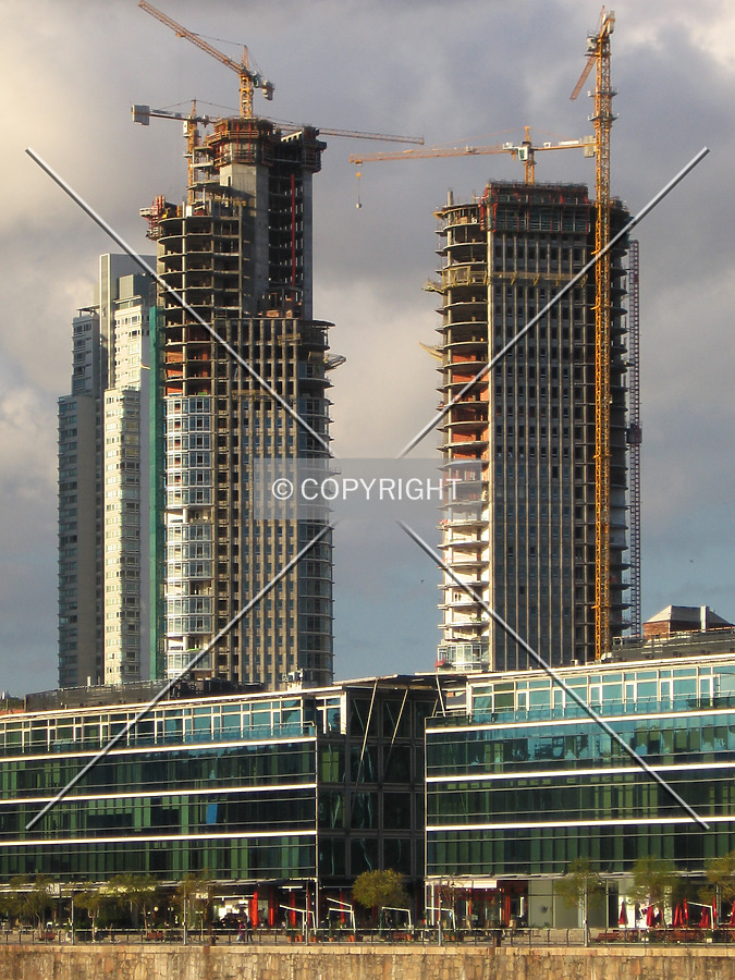 At left the north tower and the south tower at right