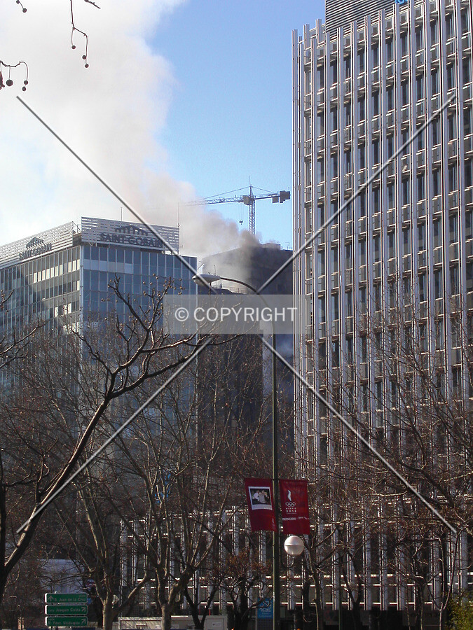 The smoke rises over the AZCA office complex