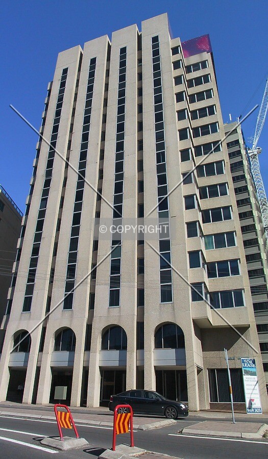 As it appeared as an office building before reconstruction