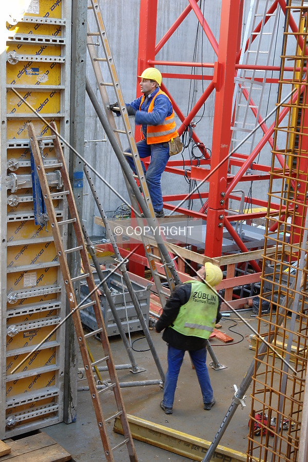Construction workers working on the formwork