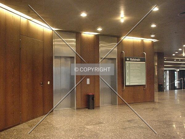 Elevators of the four-story entrance section of the building