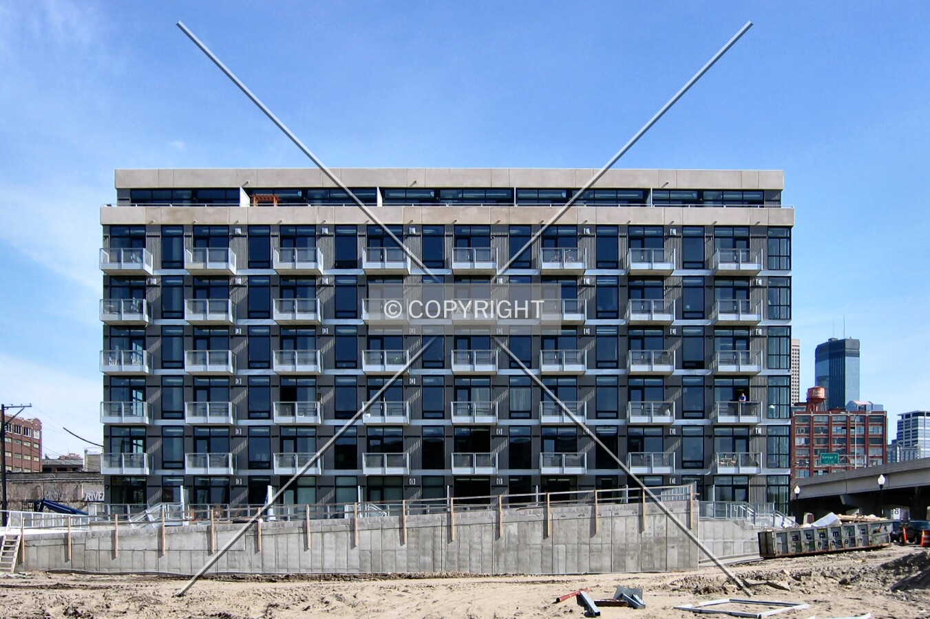 Full northwest elevation, over the site to soon be occupied by 730 Lofts