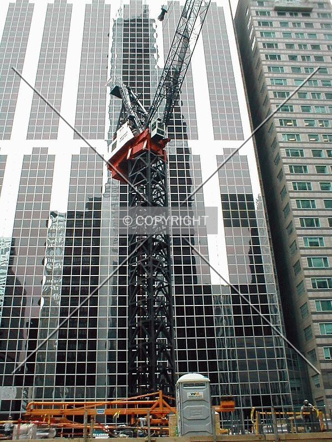 Construction crane against One South Wacker Drive and 303 West Madison Street
