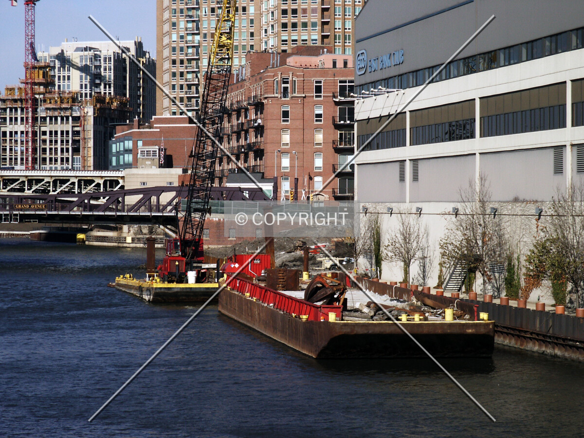 Barge and crane on the river