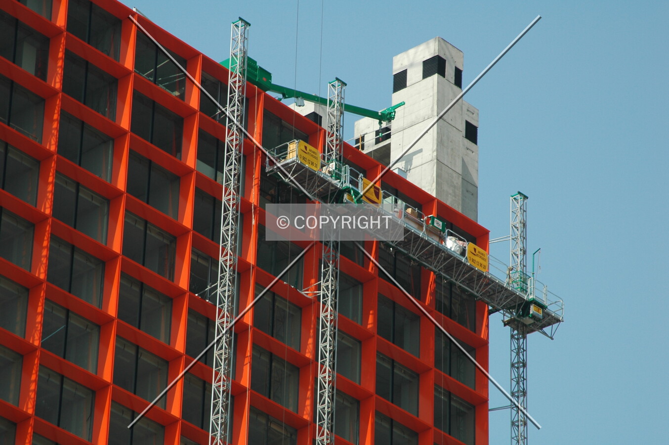 Elevator used to install the curtain wall facade