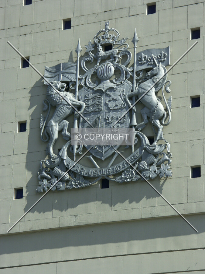 Close-up of Canada's Coat of Arms on building (in two places)