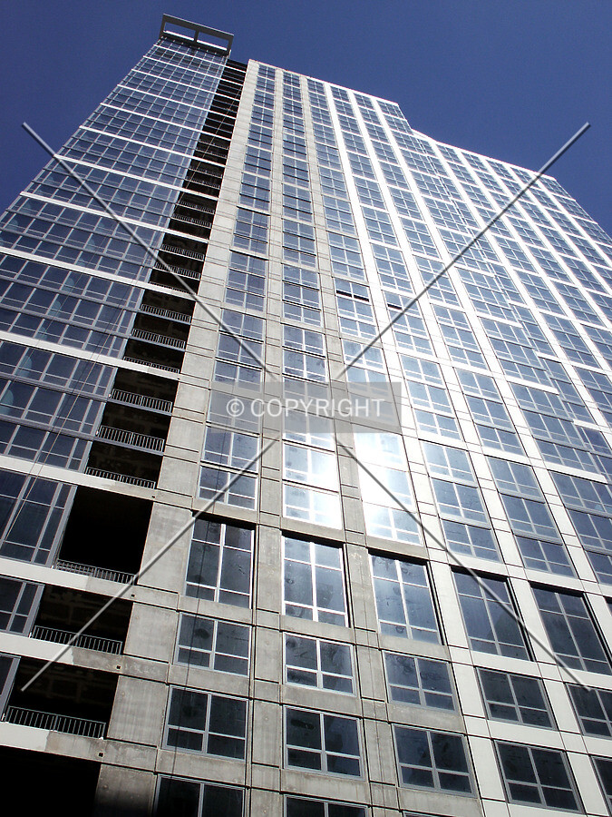 Looking up the last unpainted strip on the south facade
