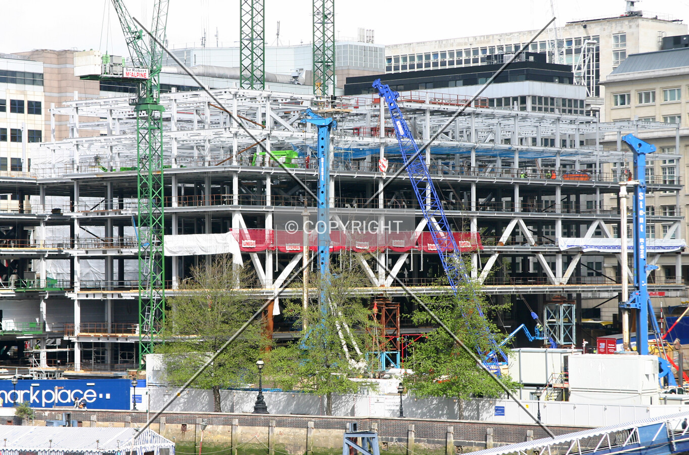 Elevated view northwest of the steel frame from London Bridge