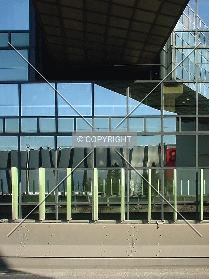 Low-rise facade below the passenger bridge