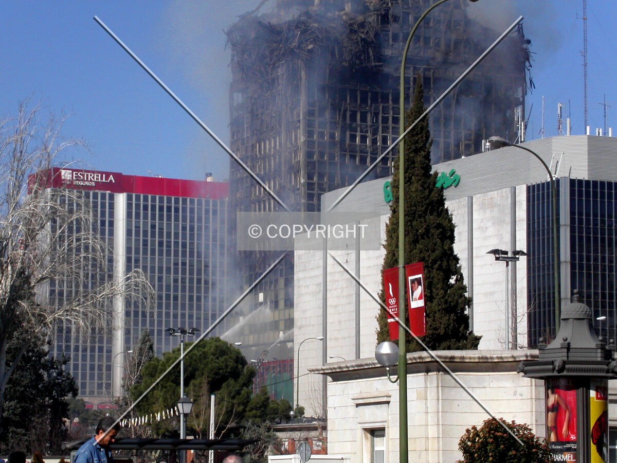 Detail of the building still on fire