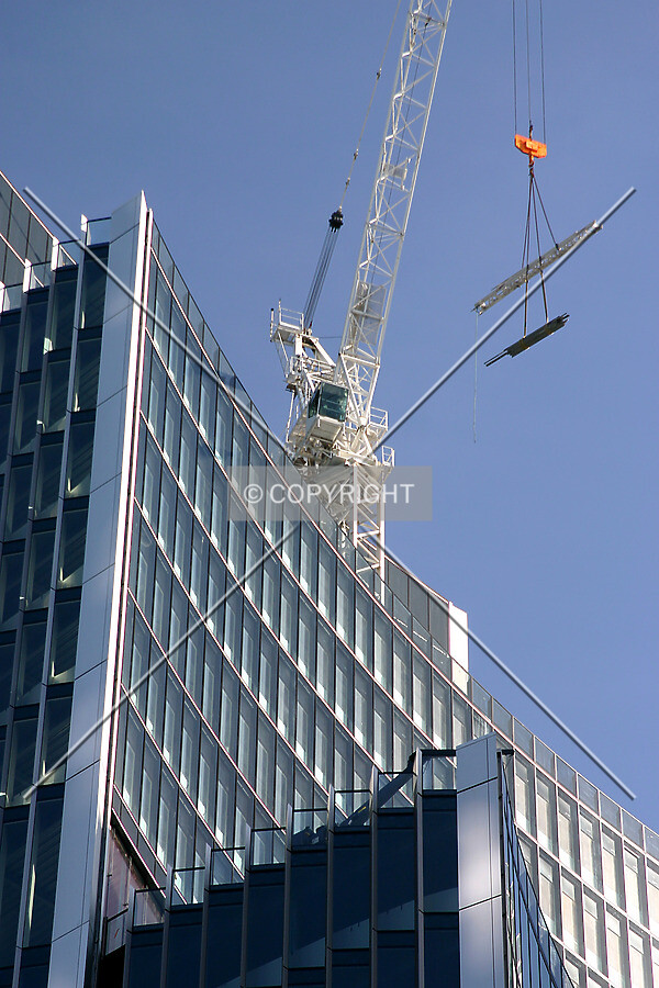 Looking up from St. Helen's Piazza at a crane in action