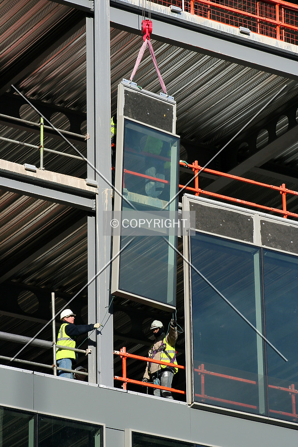 Facad panel being fitted