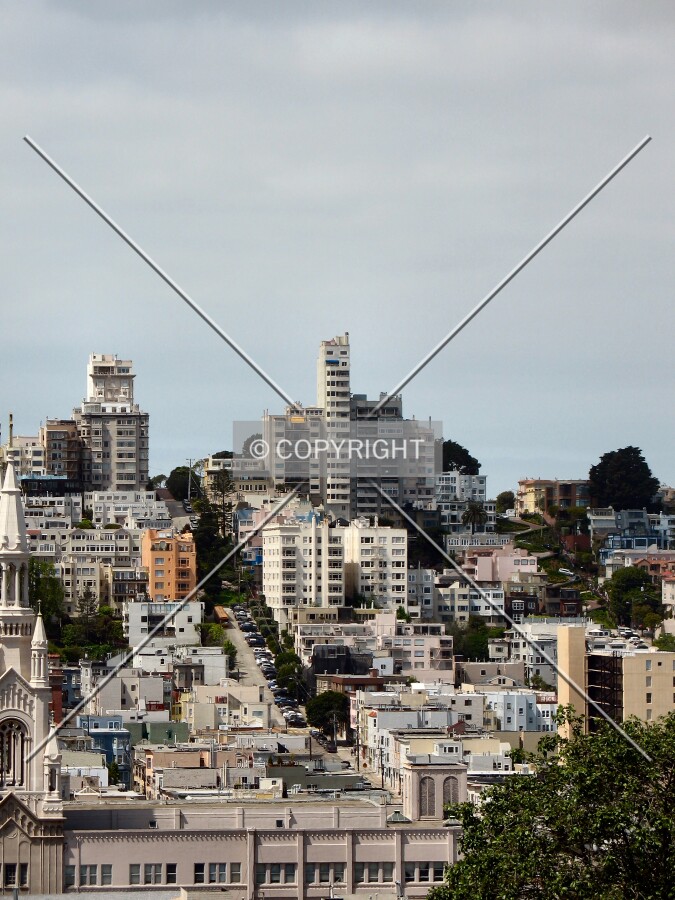 The narrow tower on the northern part of Russian Hill, viewed from the east on Telegraph Hill