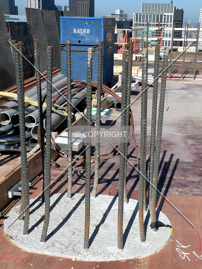 The top of a column with rebar visible