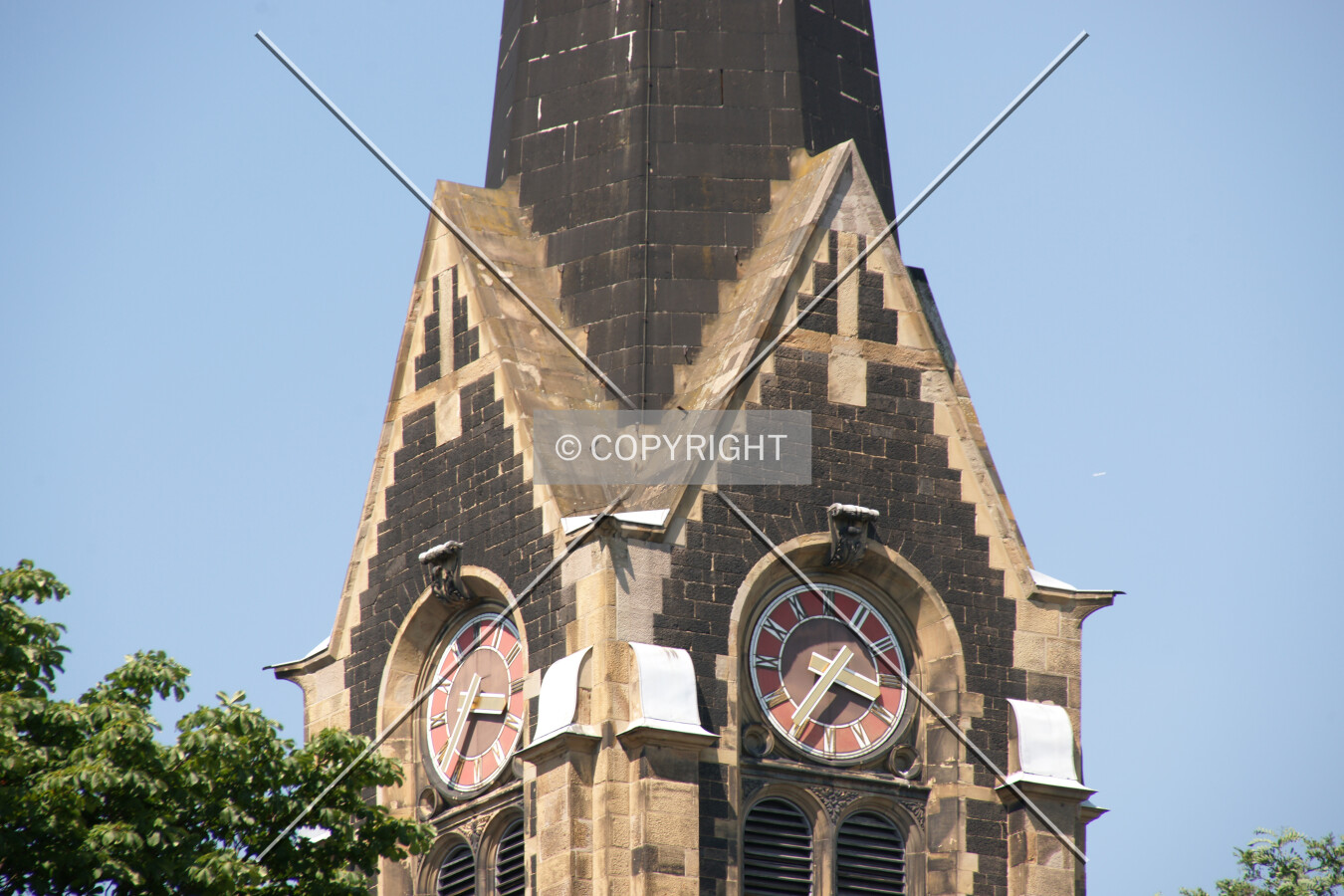 Church tower and detail of the church clock