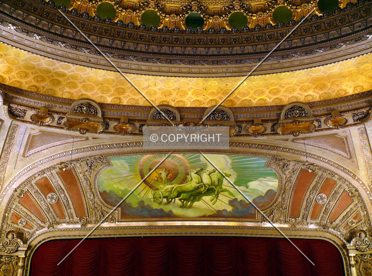 Detailing and artwork around the proscenium arch