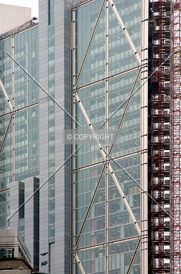 Cladding nearing completion with consruction hoist at right