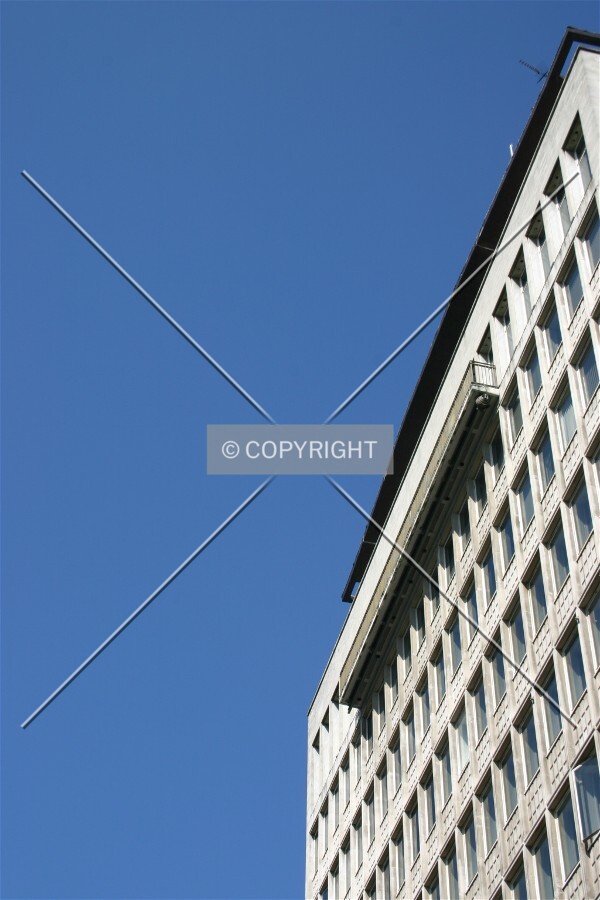 Looking up at the façade from New Oxford Street
