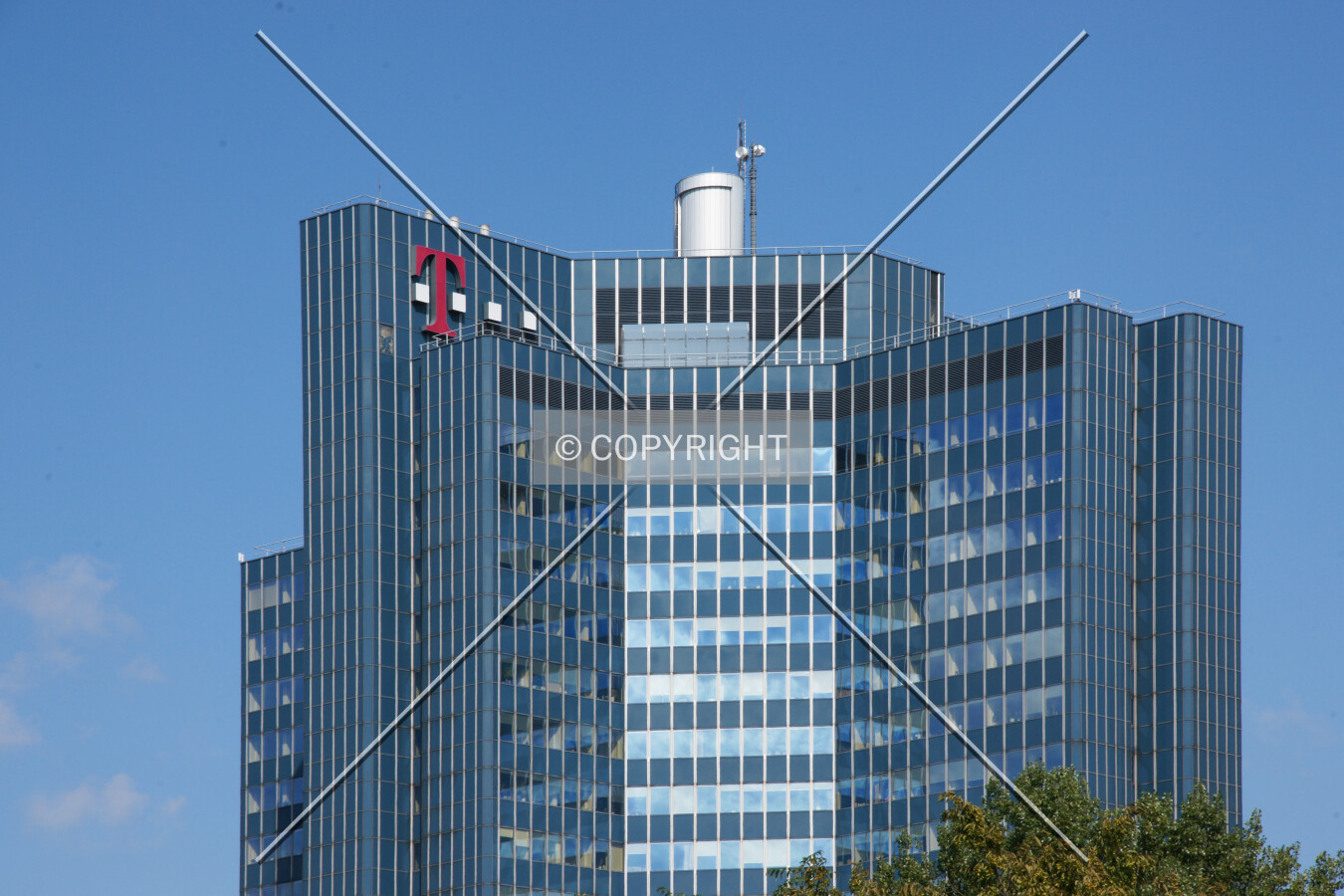 Upper section of the office building including the logo of Deutsche Telekom