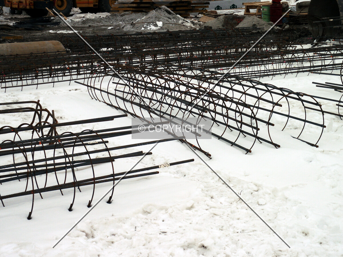 Caisson-reinforcing cages arrayed by the western edge of the site