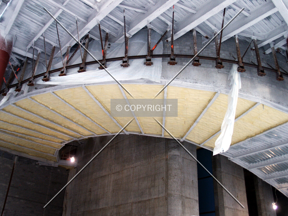 Underside of the car ramp disappearing into the lobby ceiling
