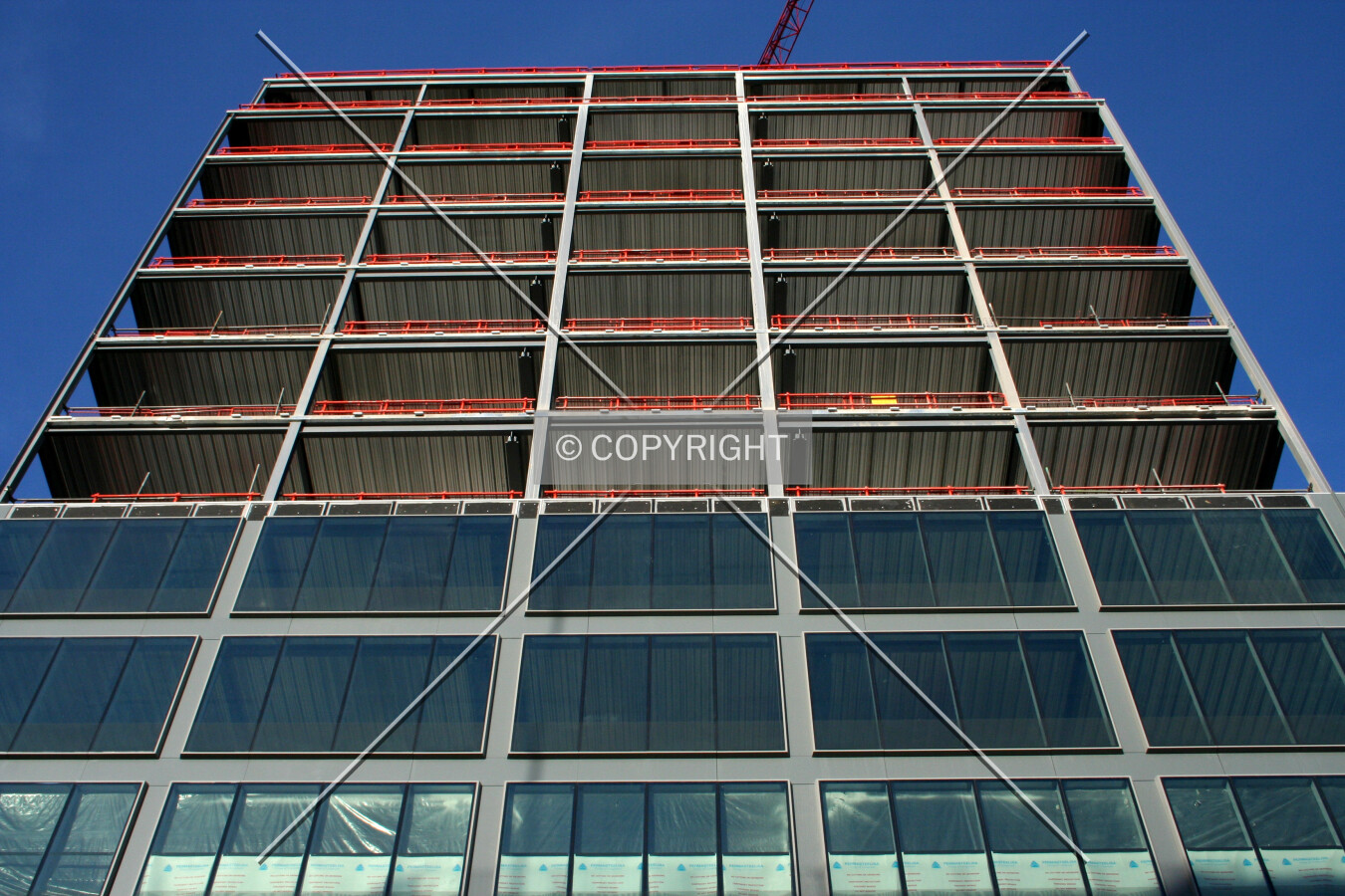 Looking up at the facade progress