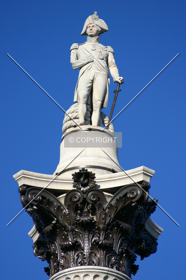 Statue of Admiral Lord Nelson atop the column with bronze acanthus leaves below