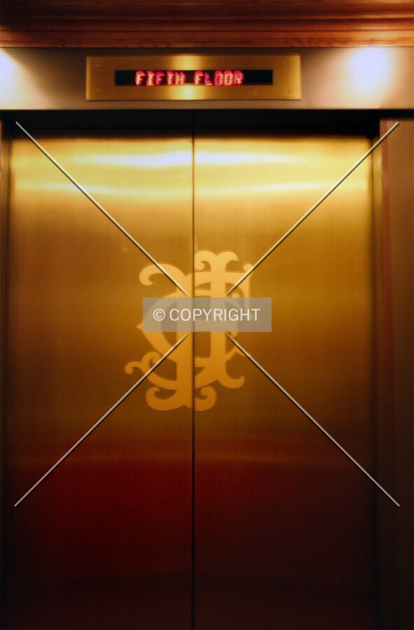 Elevator doors with the Frost logo
