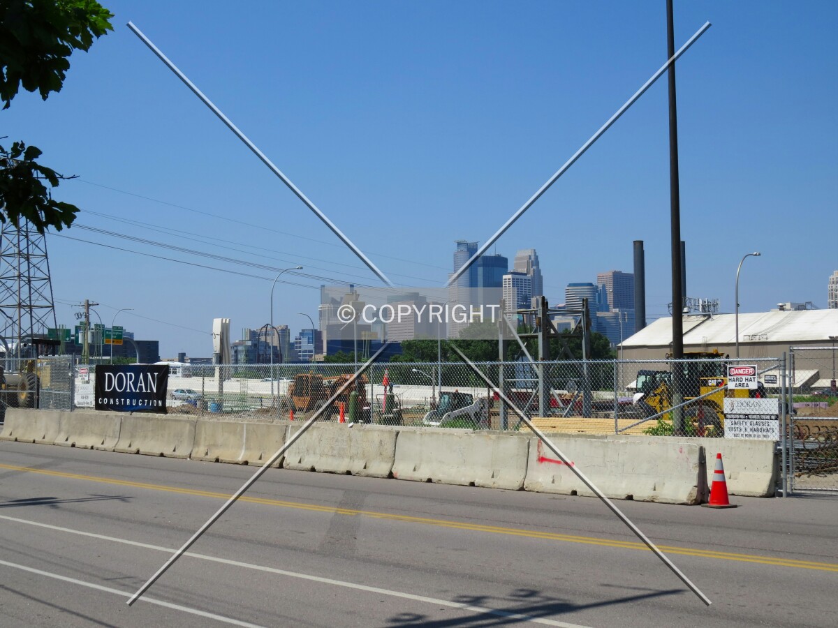 View to the southwest across 10th Avenue SE, with downtown in the distance