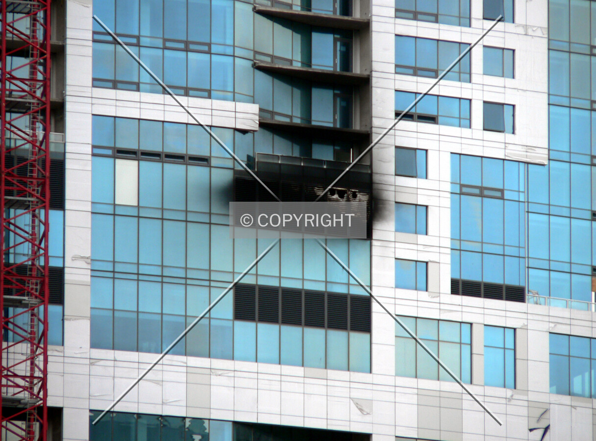 Smoke damage from a small electrical fire visible on the north face