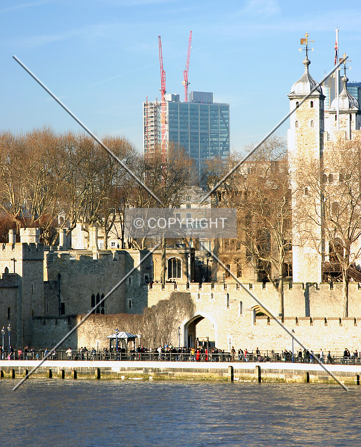 View north across the Thames from Tower Bridge with the Tower of London in the foreground