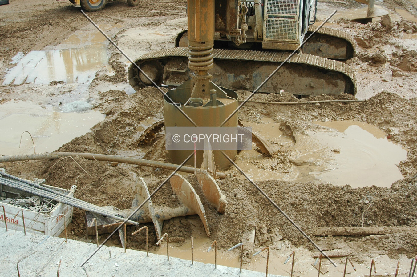 Water from the caisson hole in the ground