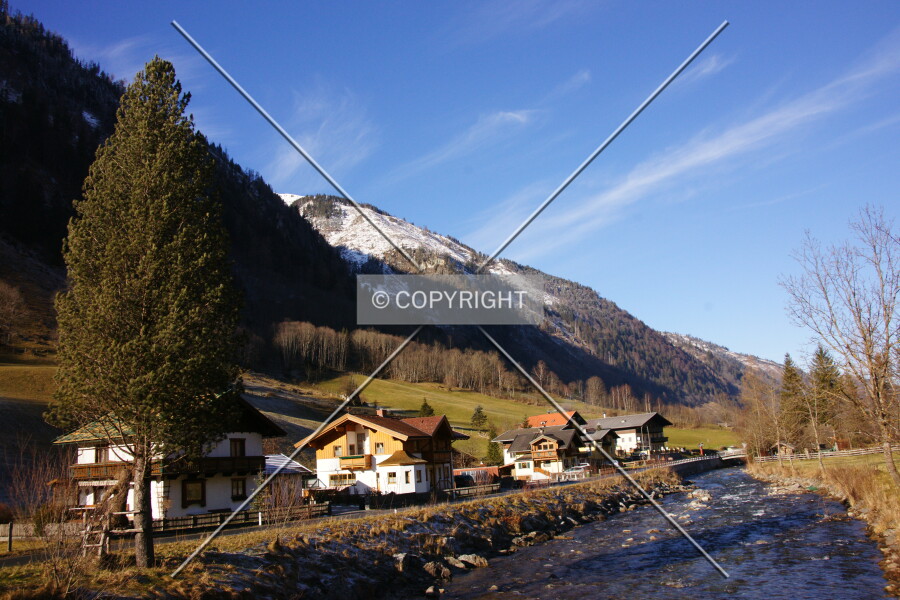 Snowy mountains and green valley