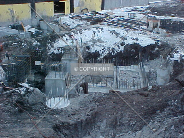 Caissons and footings; preparing for foundation construction