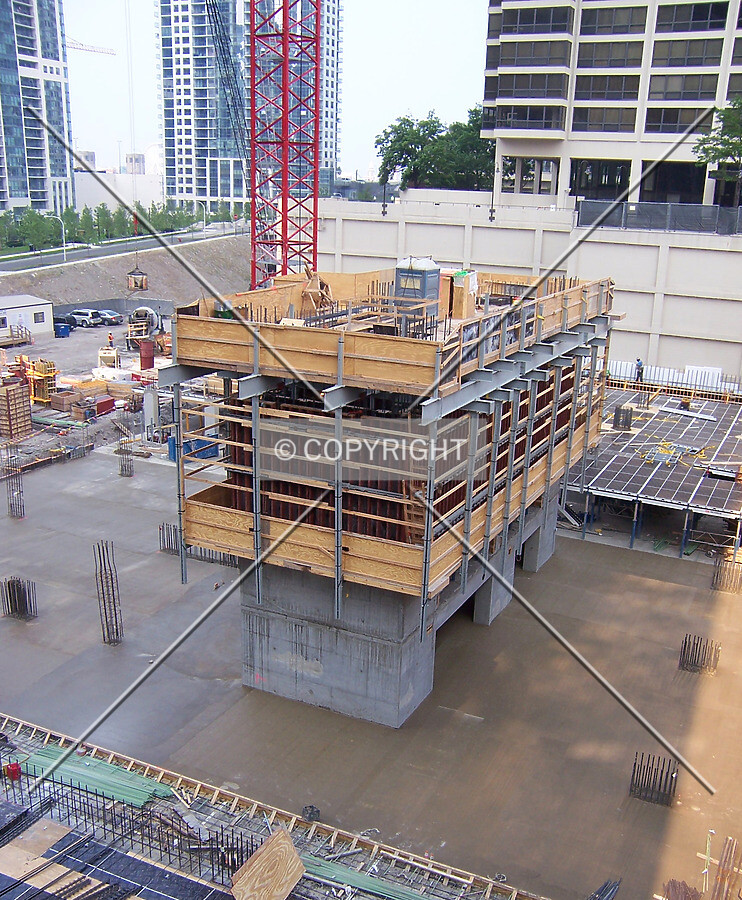 Freshly poured concrete slab with the elevator core rising in the center