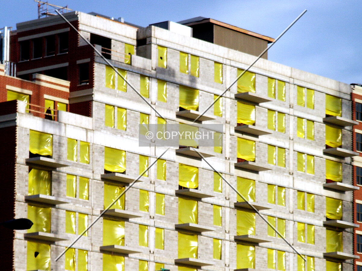 West side with yellow tarps