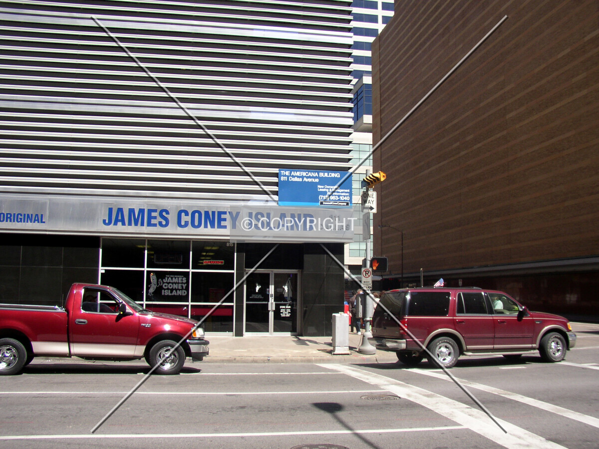 Street level restaurant and signage off Dallas Street
