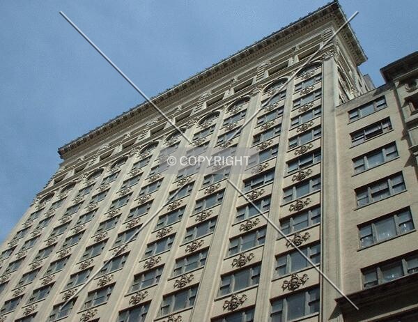 Looking up the Olive Street facade