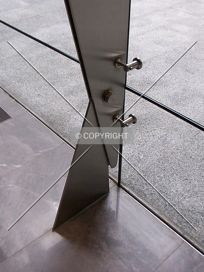 Metal fin supporting the lobby's glass wall