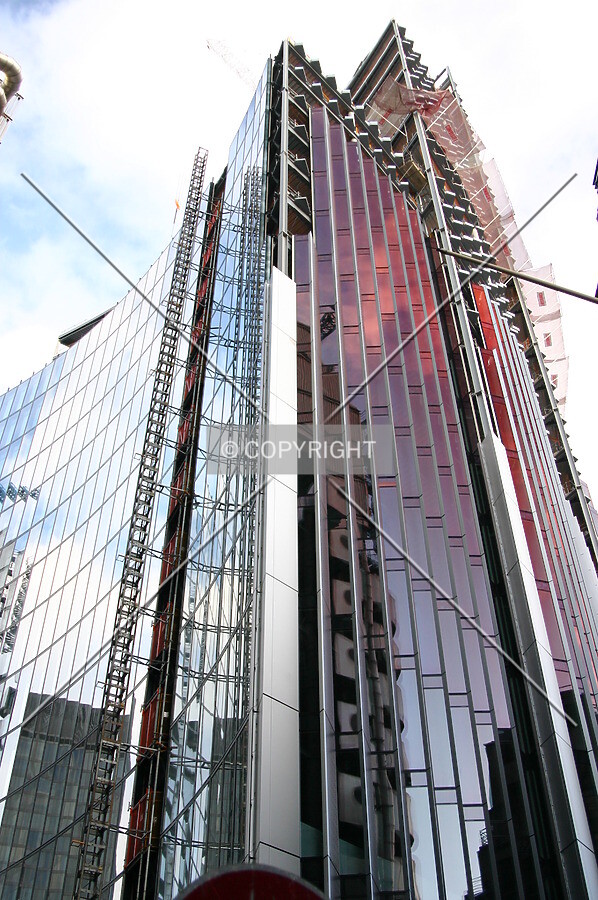 Looking up at façade installation progress from Lime Street