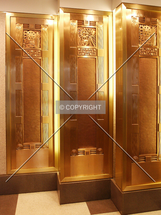Old elevator doors on display in the lobby
