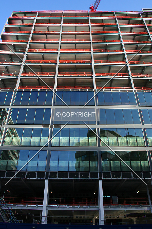 Looking up at facade progress