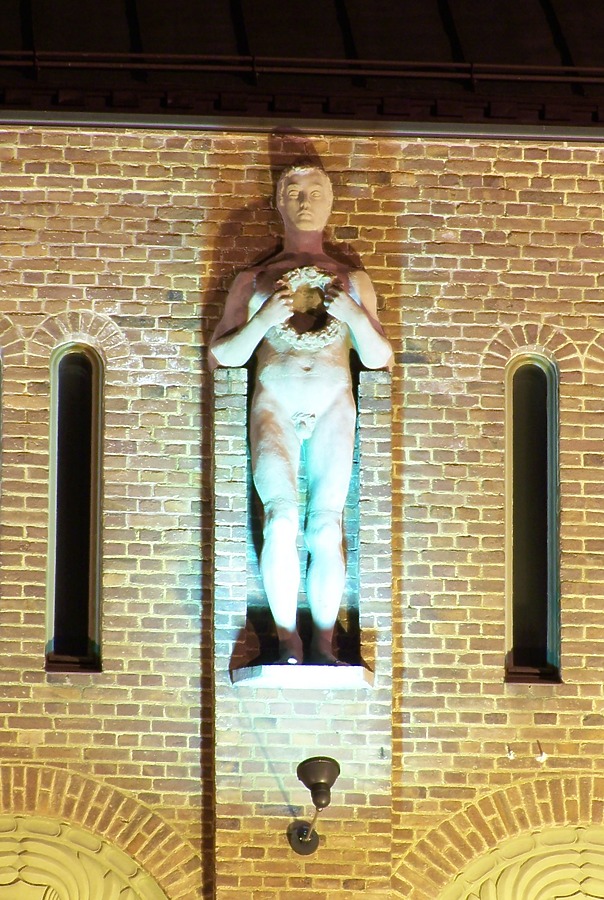 Night lighting on one of the front side statues
