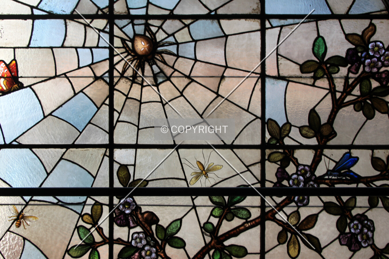 Detail of a stained glass window in the stairway